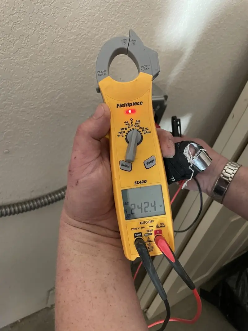 Voltage testing with clamp meter during Hot Tub / Pool Electrical Wiring in Onondaga
